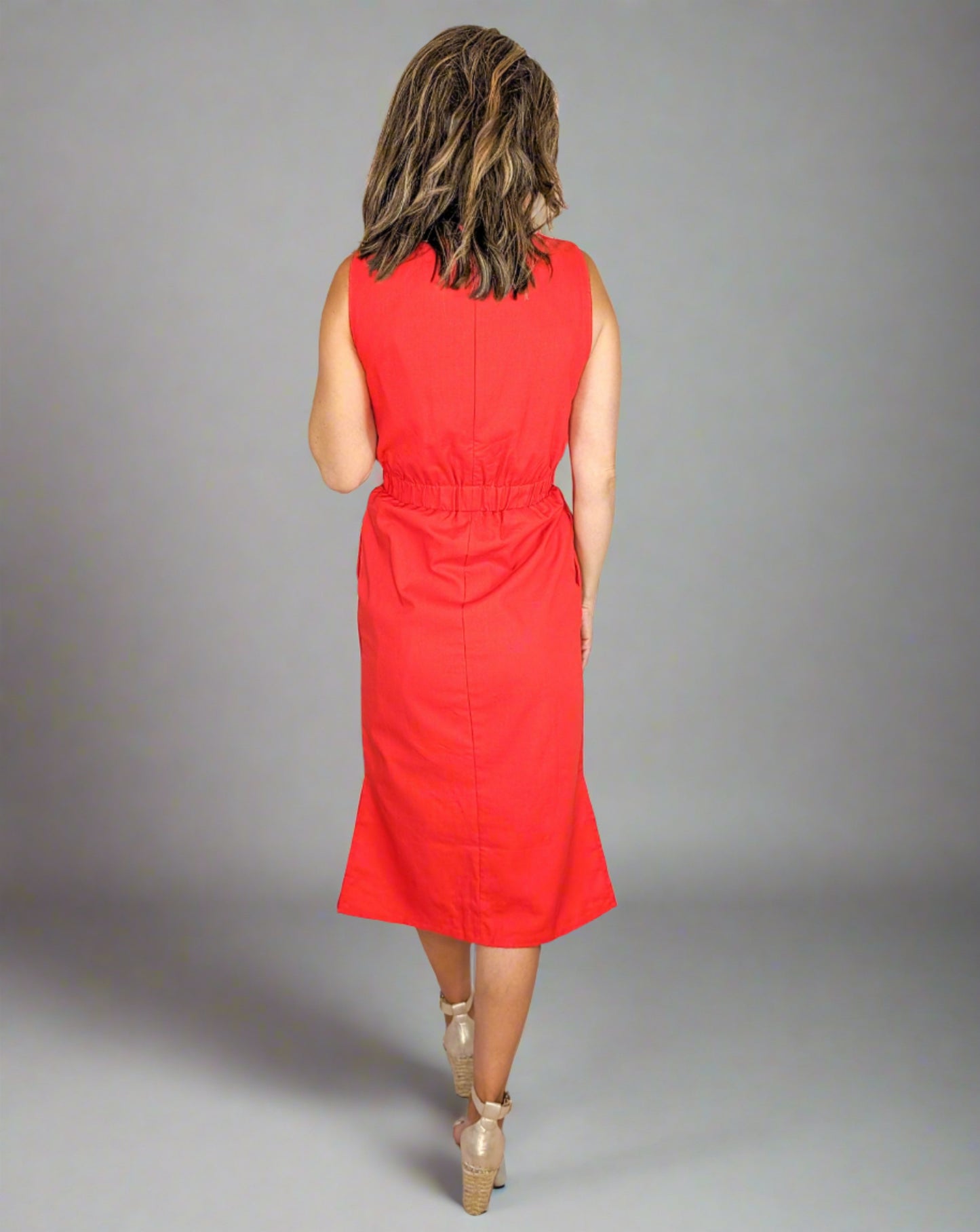 red midi length, high neck dress with pockets